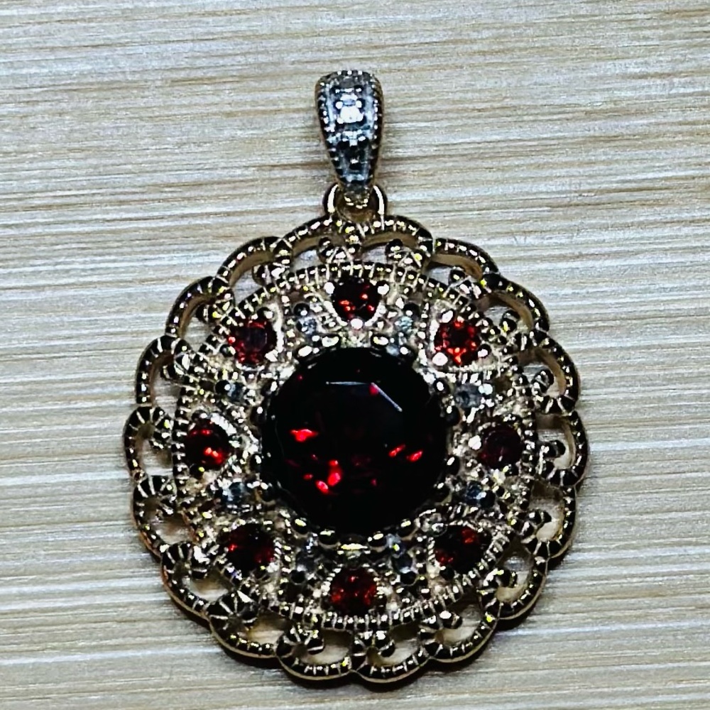 STERLING SILVER AND VERMEIL GARNET MEDALLION PENDANT 1.5” Faceted Stones